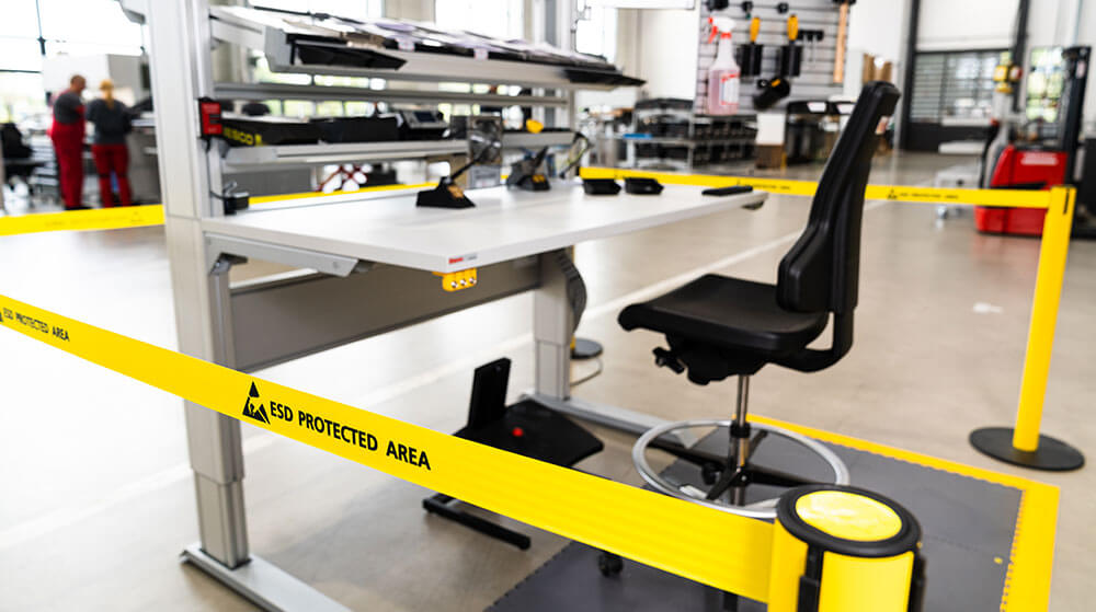 ESD protection zone, including ESD-safe work chair and work bench